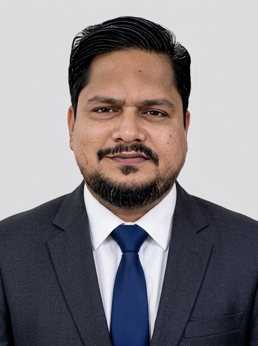 Hasan Kibria formal portrait in a suit and tie