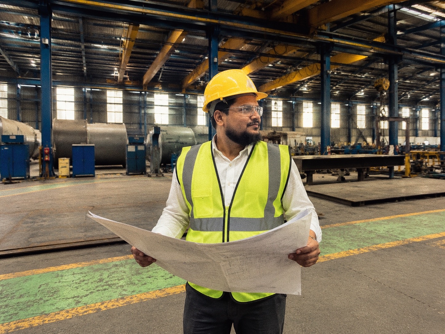 Hasan Kibria inspecting a production line